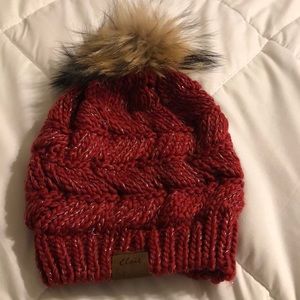Burgundy knit hat, perfect for these cool days.